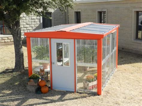 green house with metallic copper trim|mueller greenhouse panels.